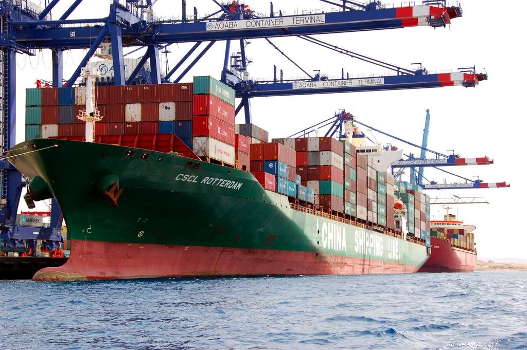 Cargo vessel loading containers at Aqaba port for EPT import and export operations